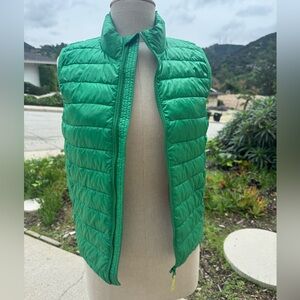 Kids' bright green puffer vest by Primary, size 12